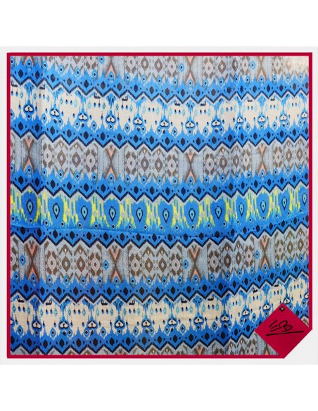 Foulard à motifs géométriques dominance bleue, finition pompons