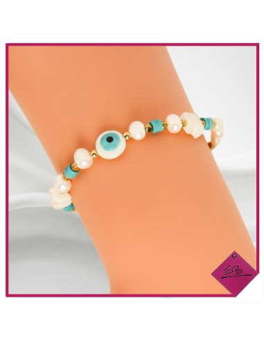 Bracelet élastiqué en acier doré, petites perles en nacre et perles fimo turquoises et blanches