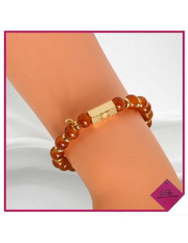 Bracelet élastiqué en acier doré et perles de verre marron
